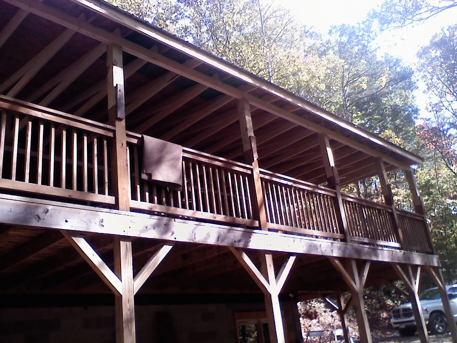 Timber framing under a new elevated porch and deck — Roof Leak Repair in Newton Falls by Roofing Brothers